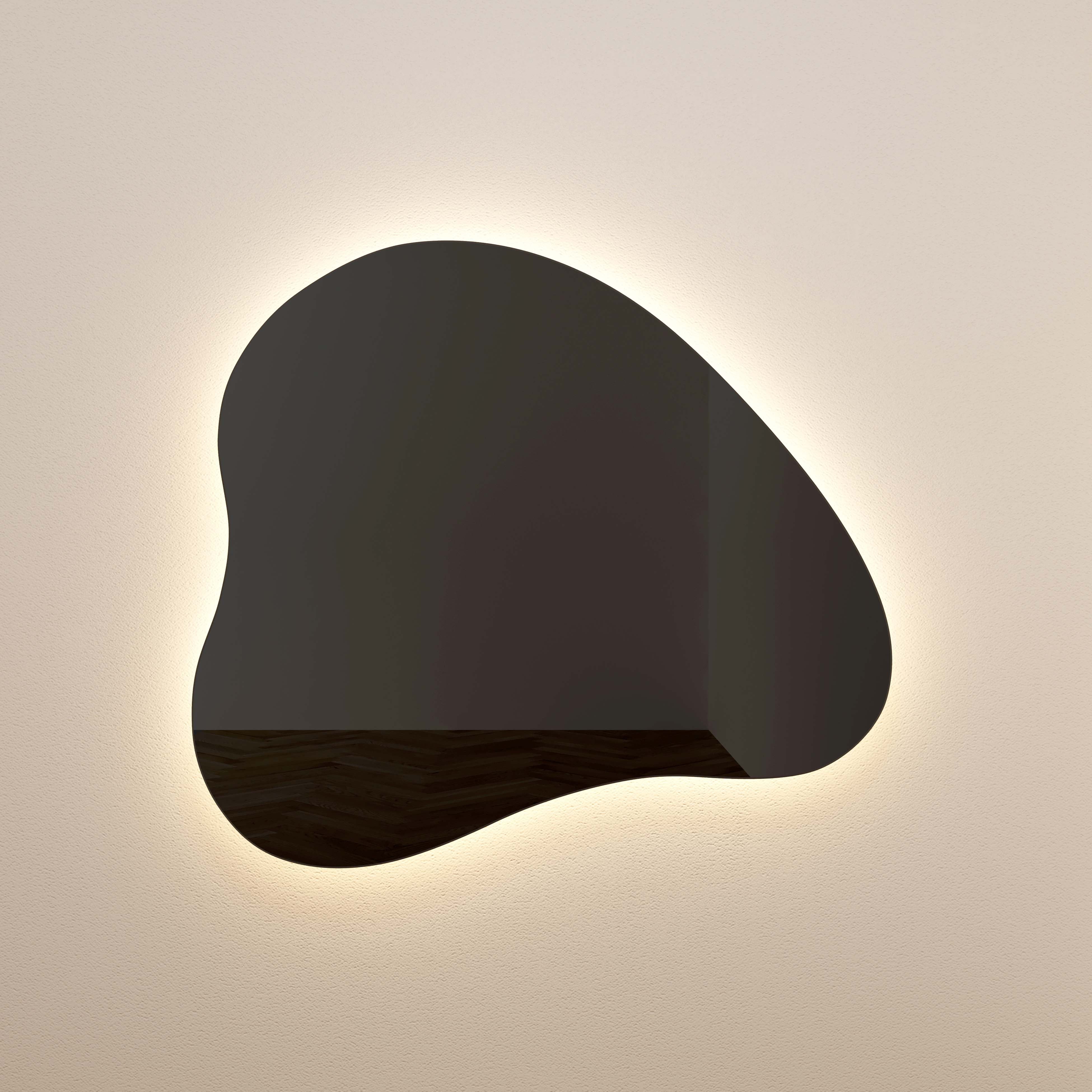 Espejo de pared LED entintado en forma de lágrima Mónica prendido.