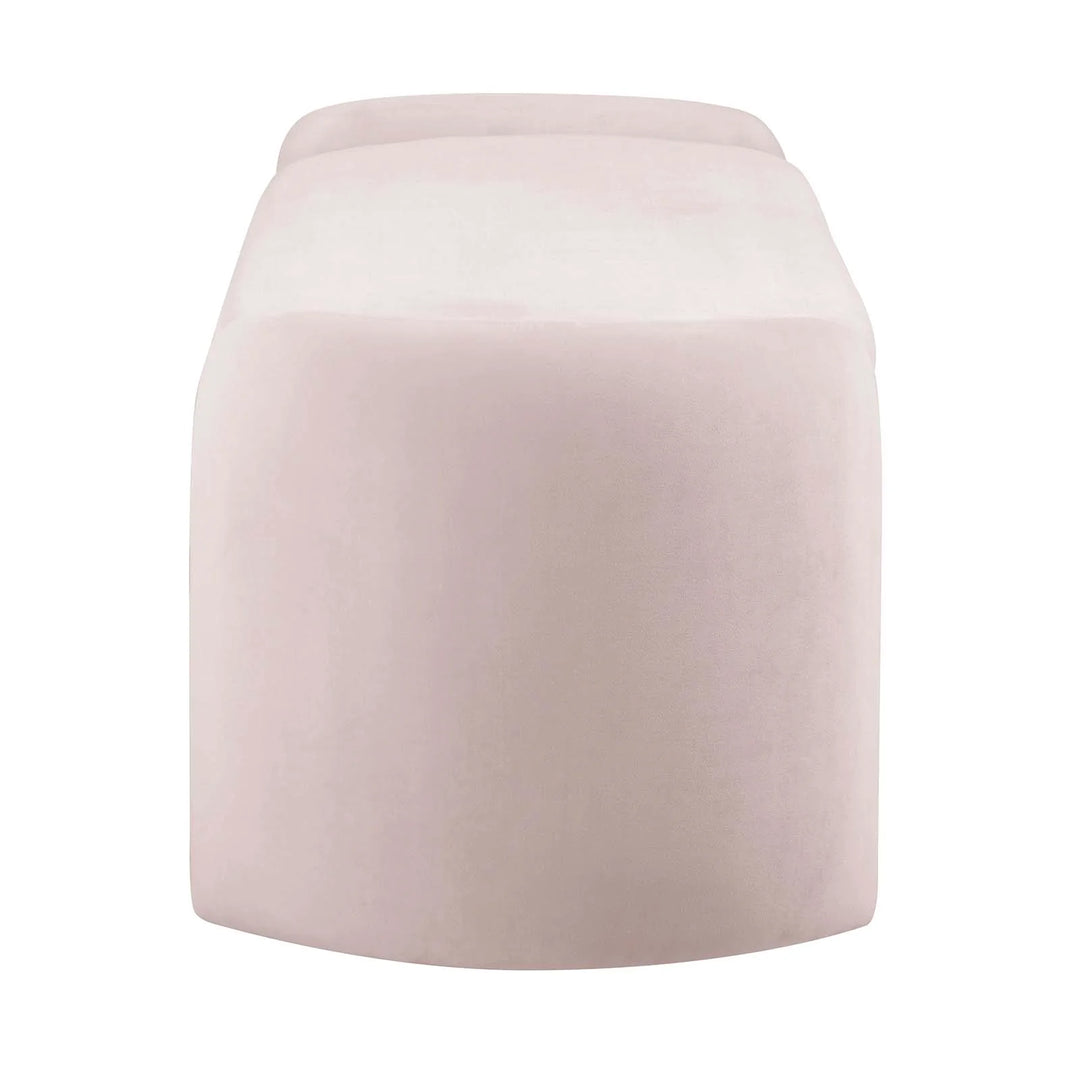 Banca de terciopelo rosa con almacenamiento Raga de lado.