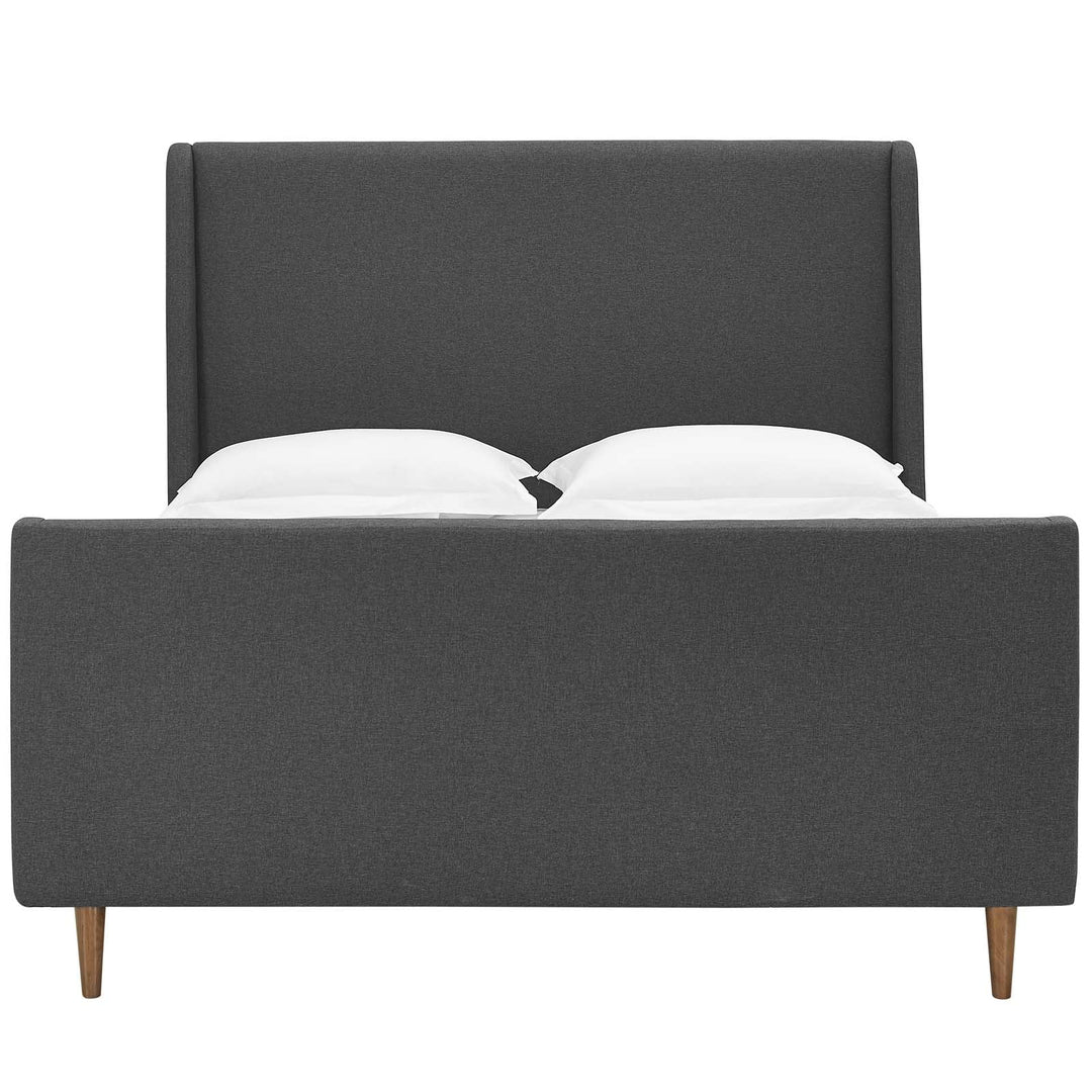 Cama Queen con plataforma tipo trineo tapizada en tela Noha