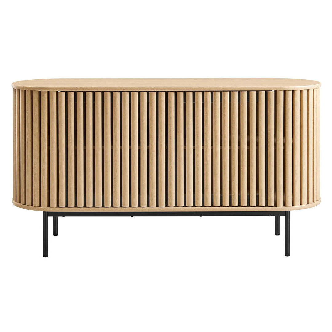 Credenza ovalada con madera estriada color roble Veron de frente.