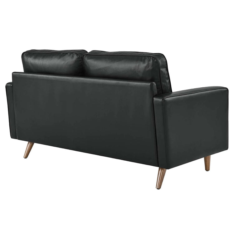 Loveseat de cuero Tanan color negro de espaldas.