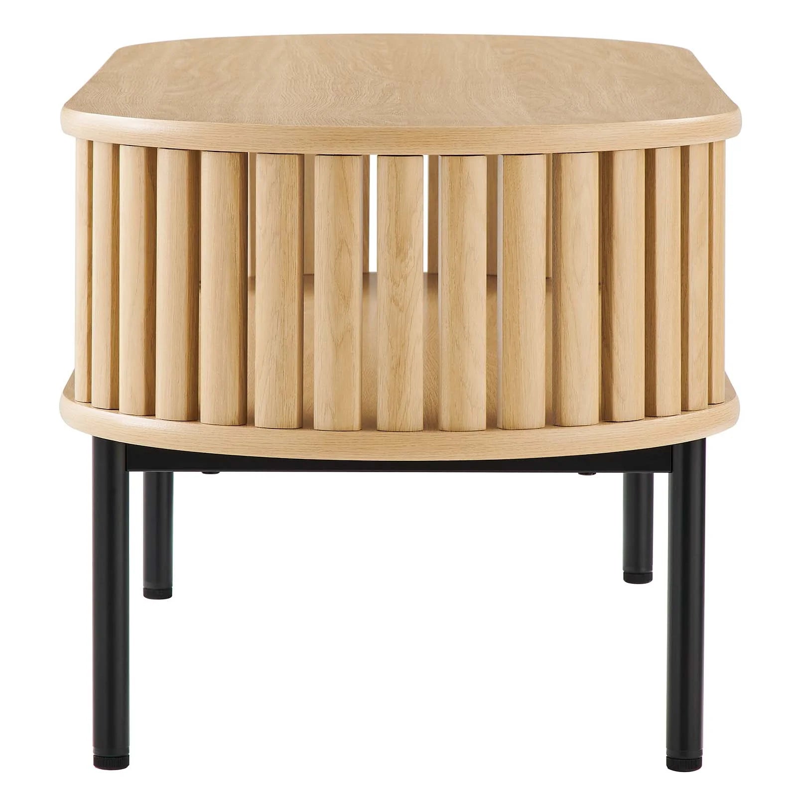 Mesa de centro ovalada de madera color roble Veron de lado.