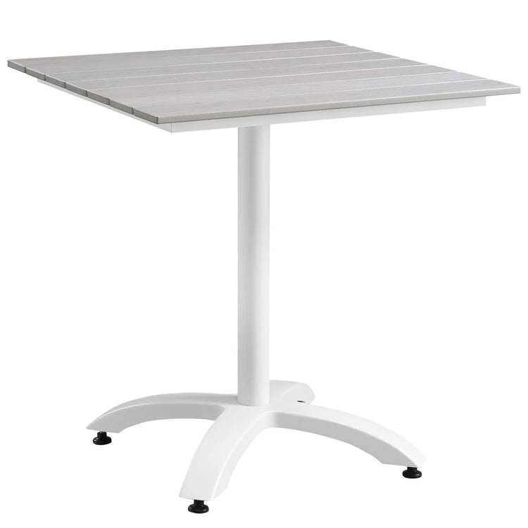 Mesa de comedor exterior de 28” de madera sintética y aluminio Lore color gris claro.