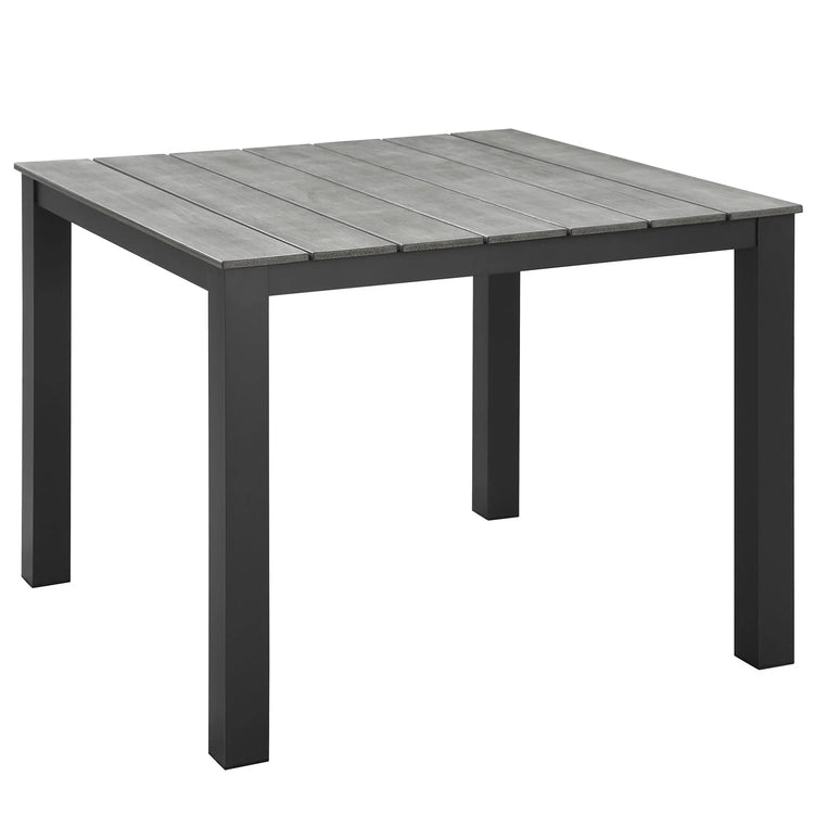 Mesa de comedor exterior de 40” Lore color marrón gris.