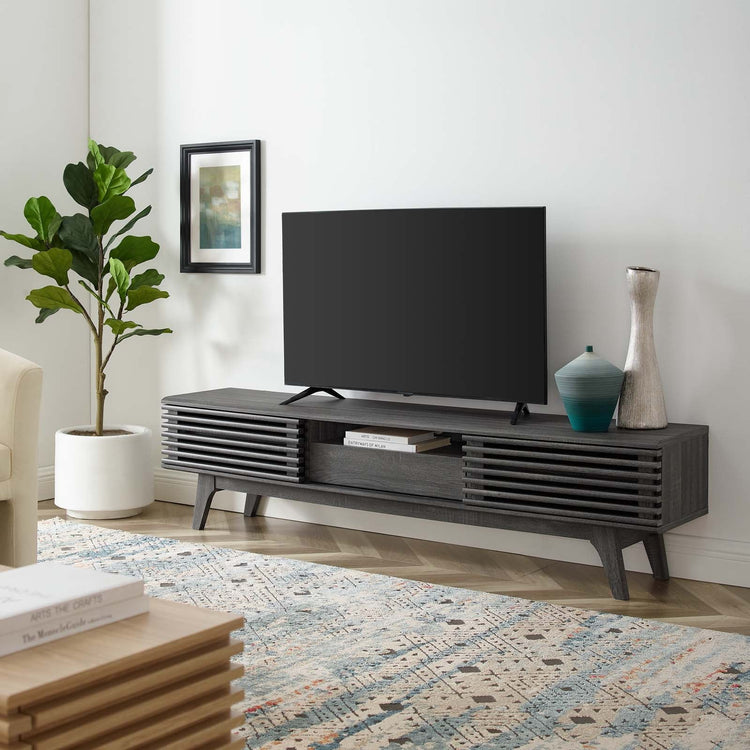 Mueble de 70” para TV Niklas color negro en una sala.