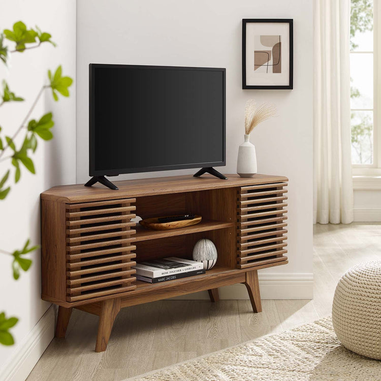 Mueble esquinero de 46” para TV Niklas color nogal en una sala.