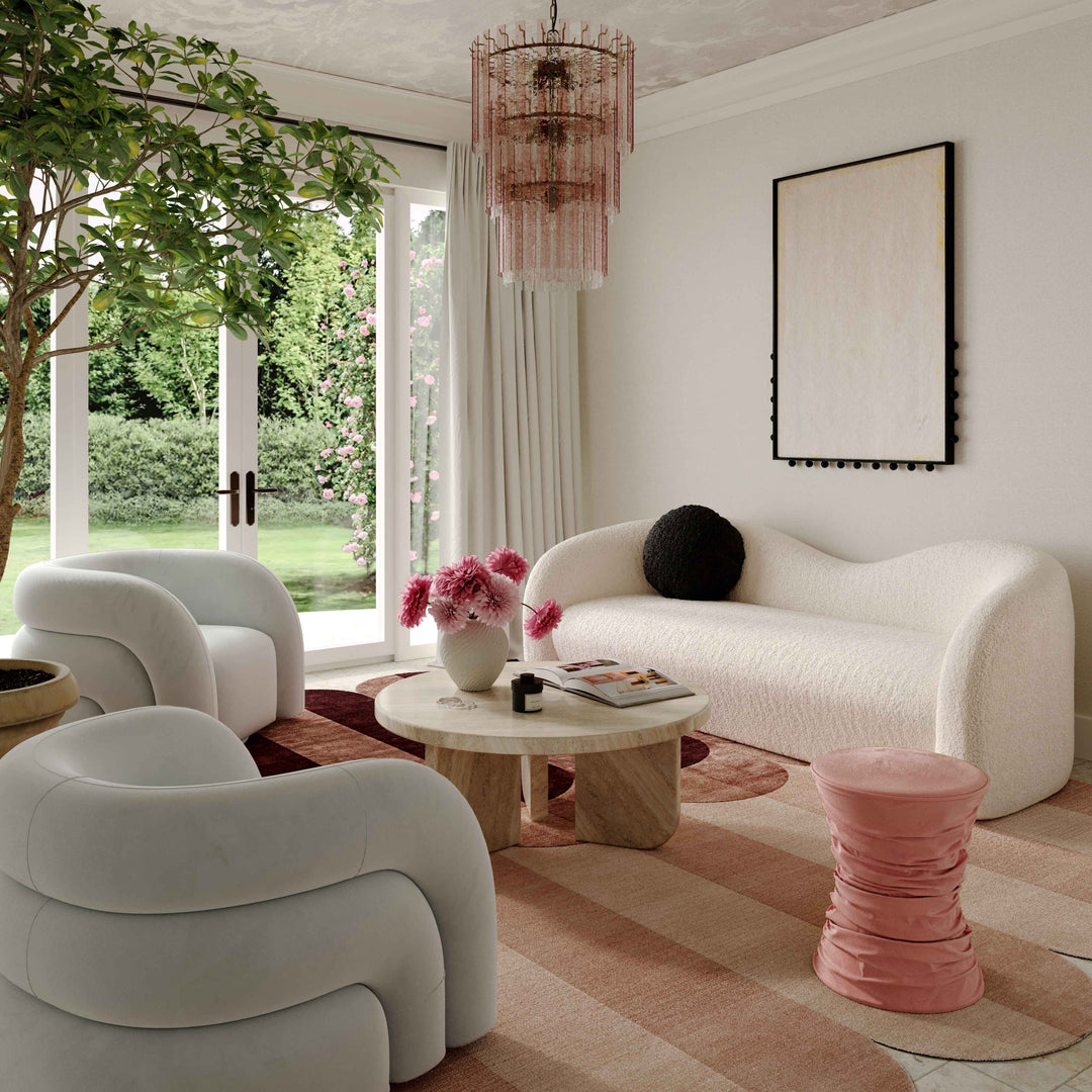 Ottoman Petra color rosa en una sala junto a Sillas de acento Erasme SGER-02 y Mesa de Centro Melika MCPA-01.