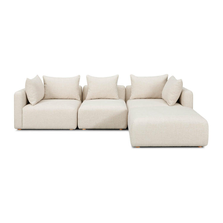 Seccional modular de 4 piezas Emory de tela texturizada gruesa color crema.