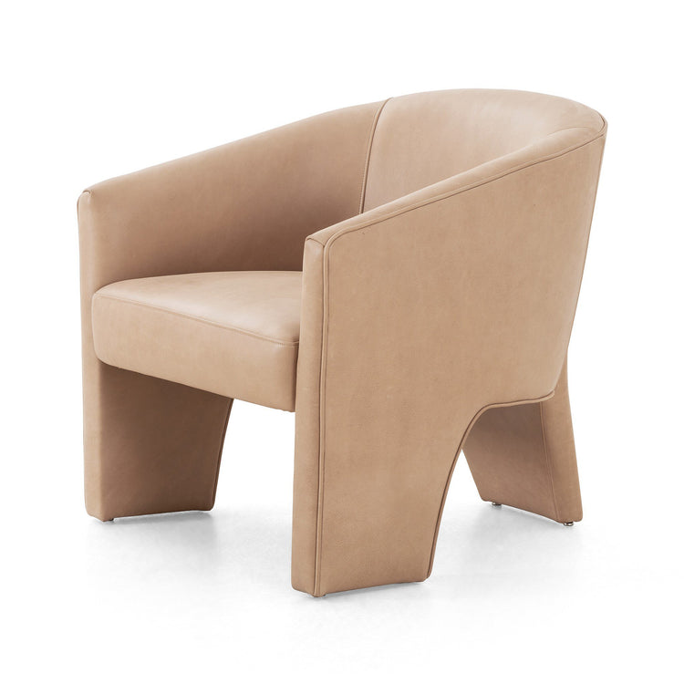 Silla con diseño de tres patas Armant de piel color cuero.
