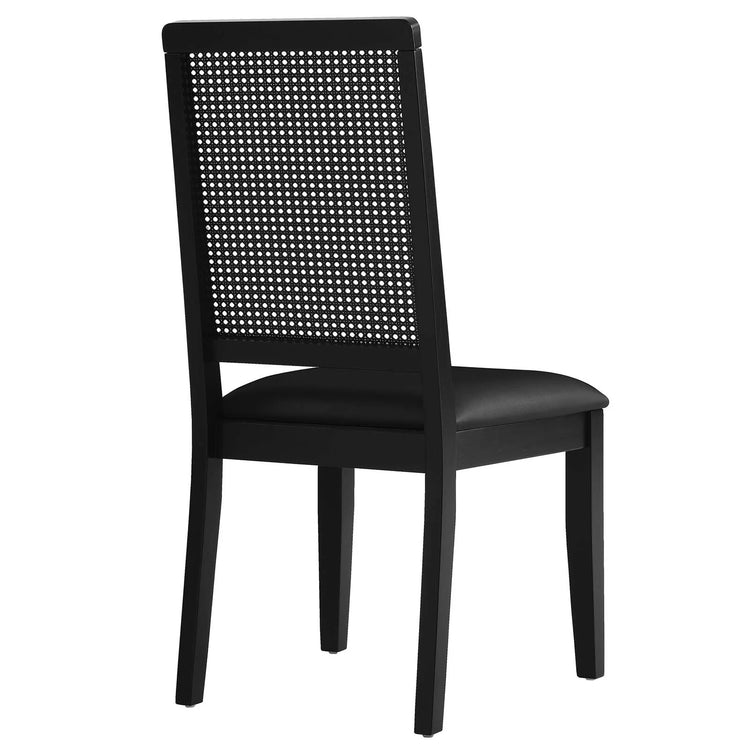Silla de comedor de piel vegana color negro marco negro con ratán sintético Enzo de espaldas.