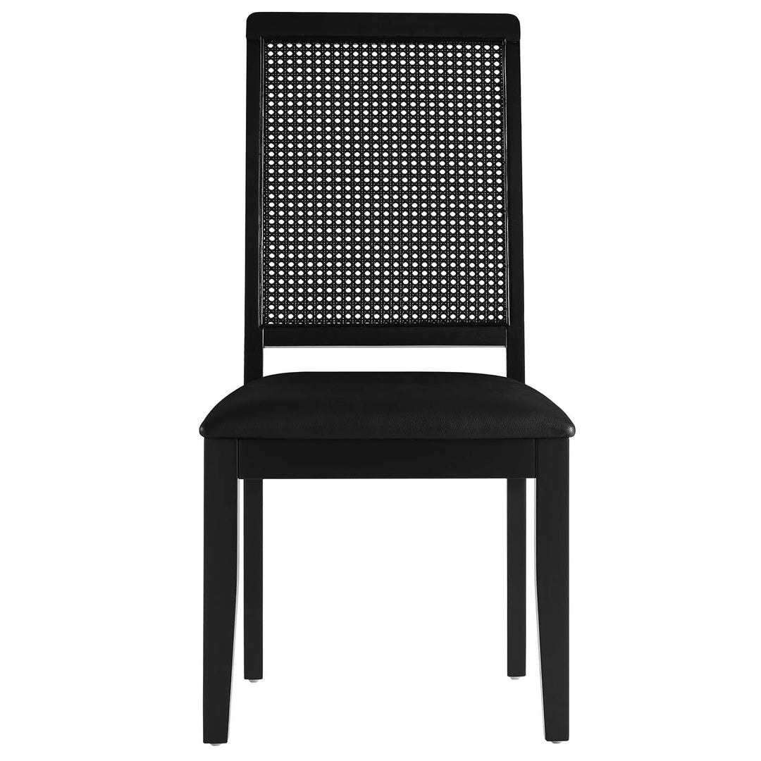Silla de comedor de piel vegana color negro marco negro con ratán sintético Enzo de frente.