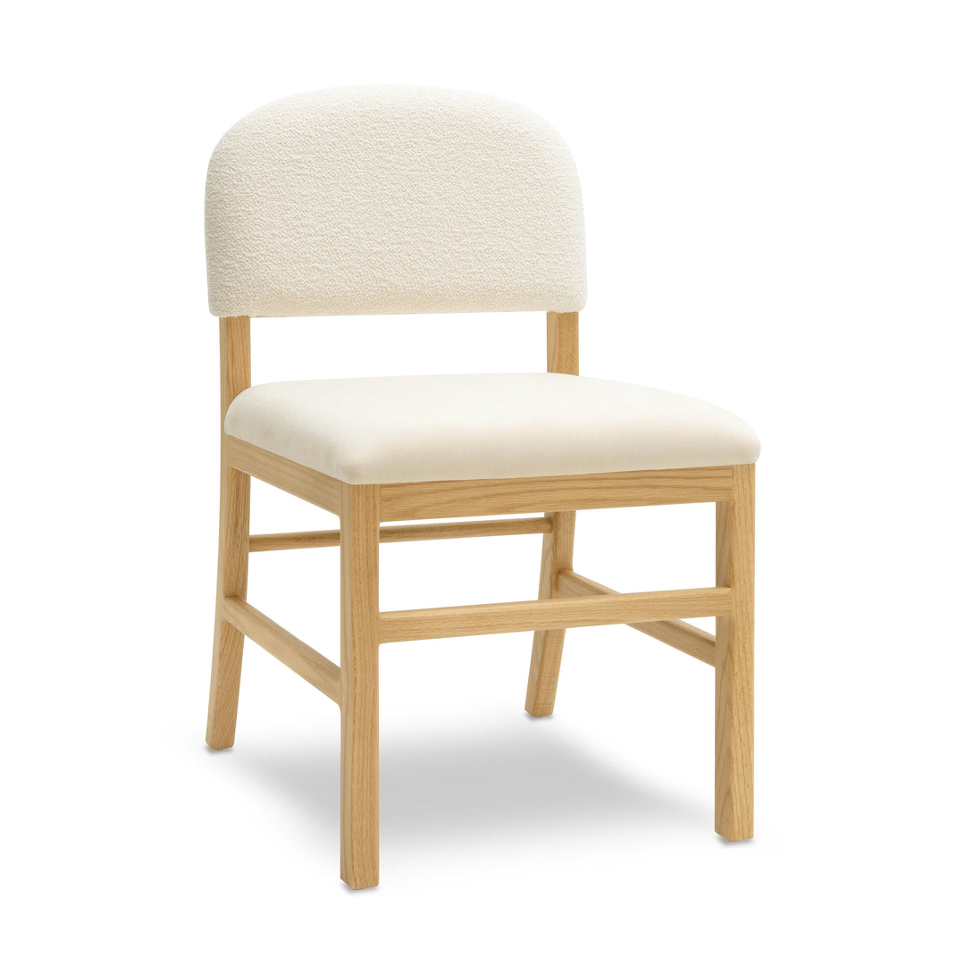 Silla de comedor de terciopelo crema Maykel.