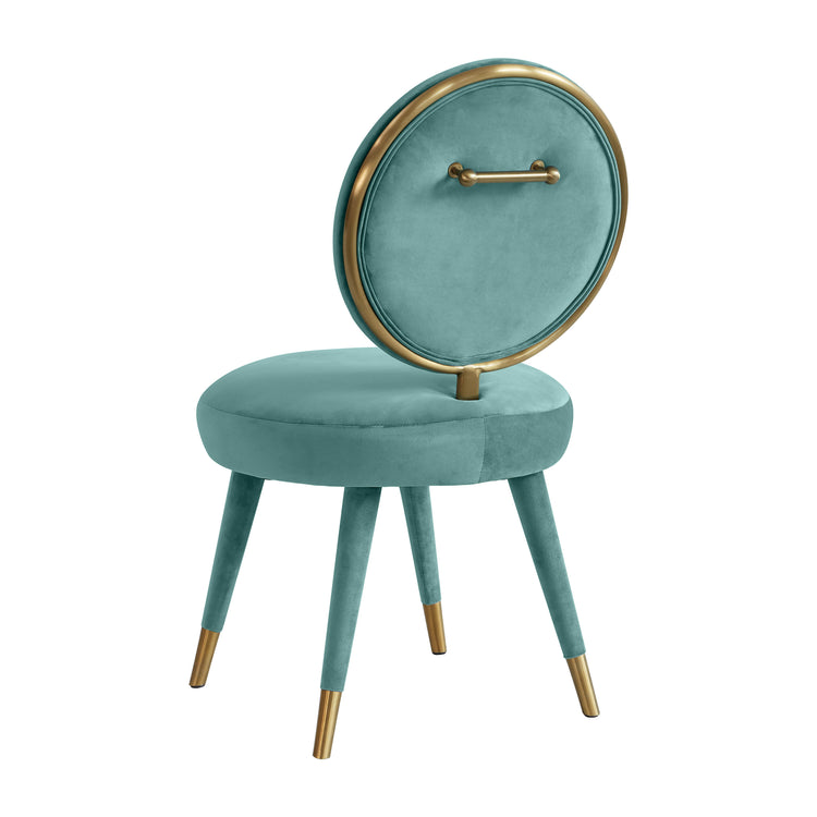 Silla mecedora de terciopelo azul mar Ellyn de espaldas.