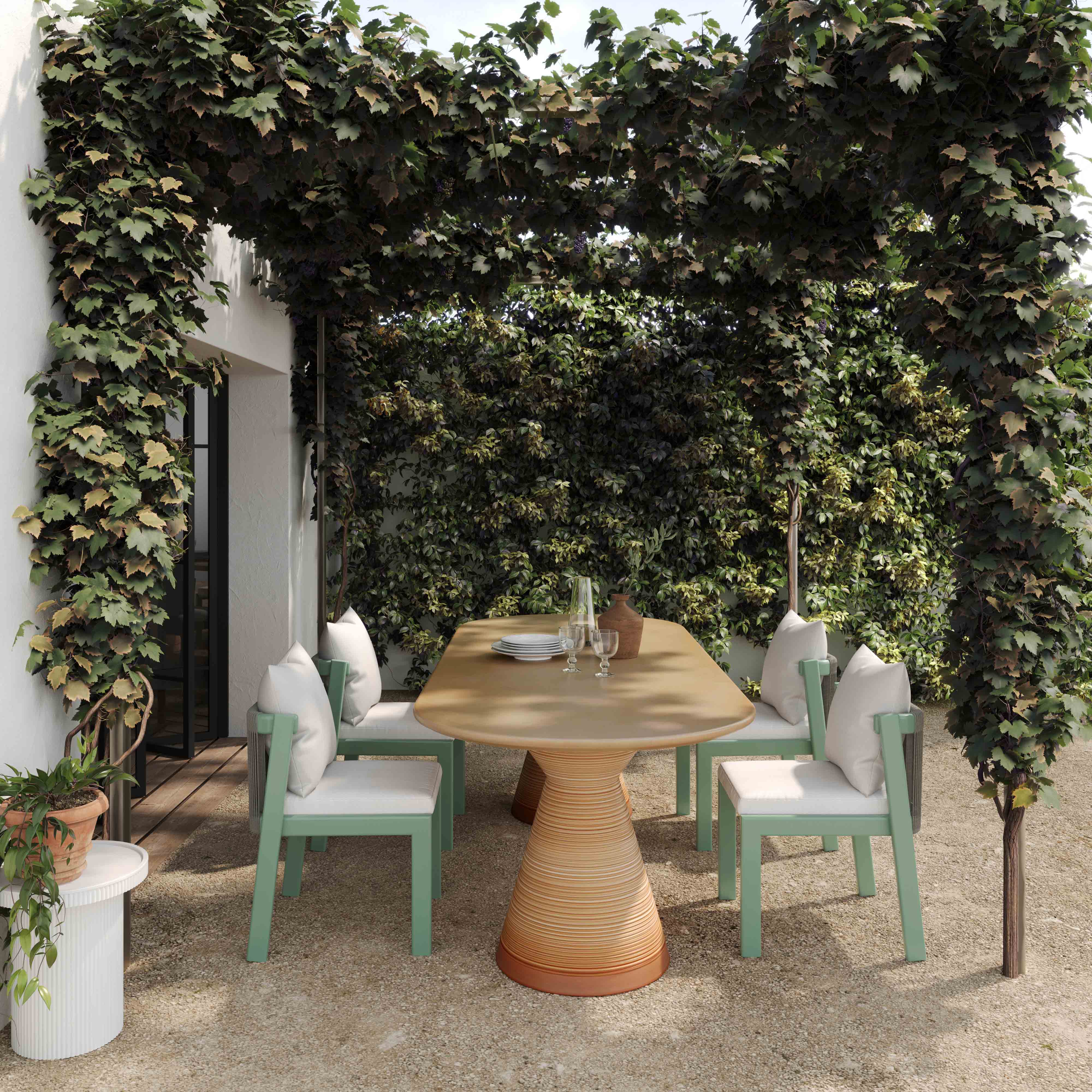 Silla para exterior de aluminio color verde menta y cuerda Sebastián en un patio exterior y mesa lateral Florence MLFL-02.