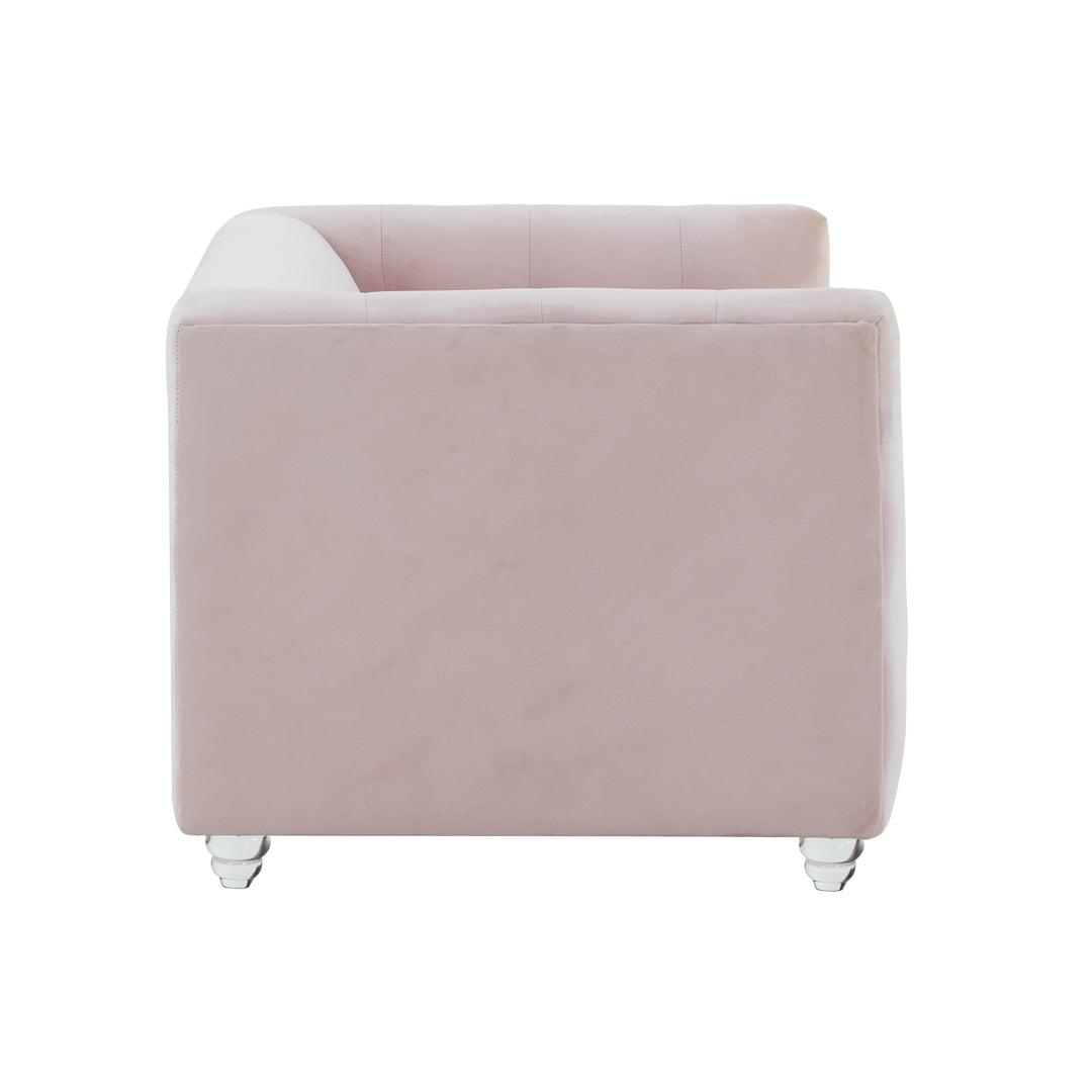 Sofá de terciopelo para mascota rosa Halima de lado.