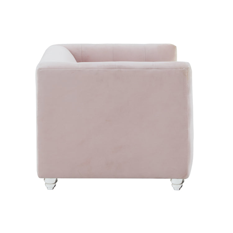 Sofá de terciopelo para mascota rosa Halima de lado.