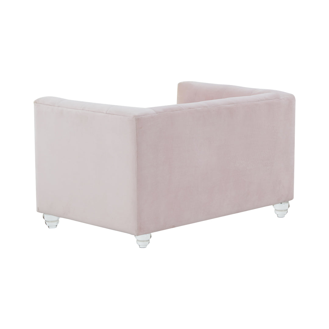 Sofá de terciopelo para mascota rosa Halima de atrás.