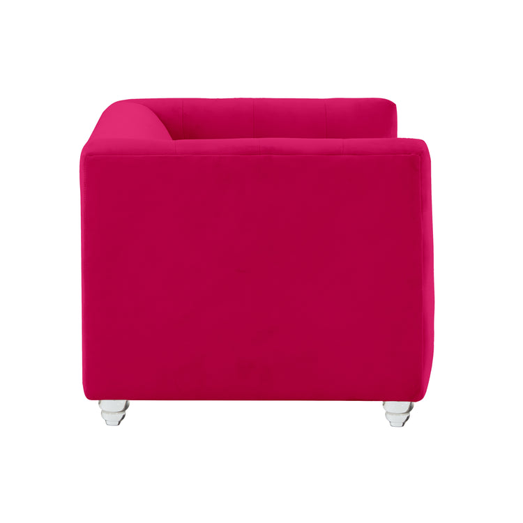 Sofá de terciopelo para mascota rosa ardiente Halima de lado.