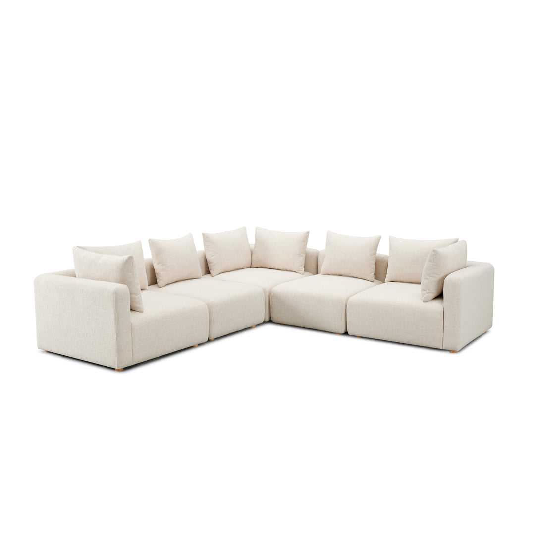 Sofá seccional modular de 5 piezas Emory de tela gruesa texturizada color crema.