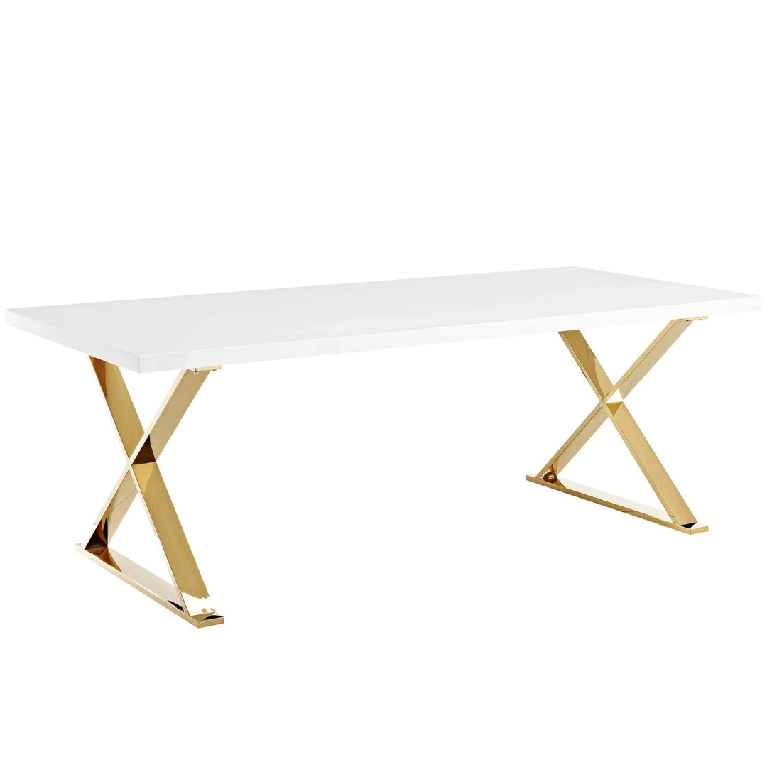 Comedor moderno con base dorada en acero inoxidable Helia.