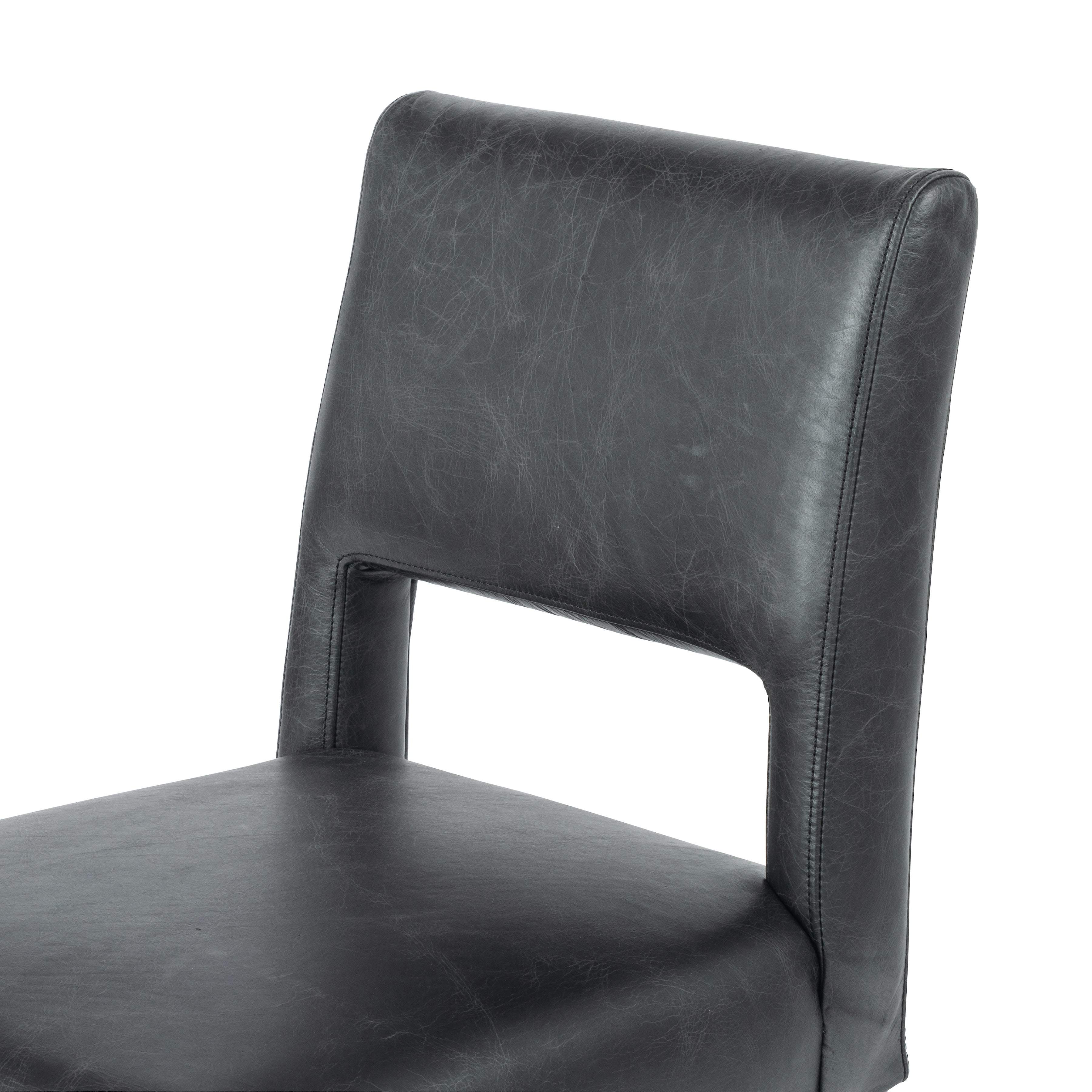 Silla de comedor negra de piel Claire 2.